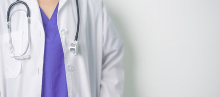 Healthcare and medical concept. doctor hand hold stethoscope in hospital. Health background, wellness and Insuranceの写真素材
