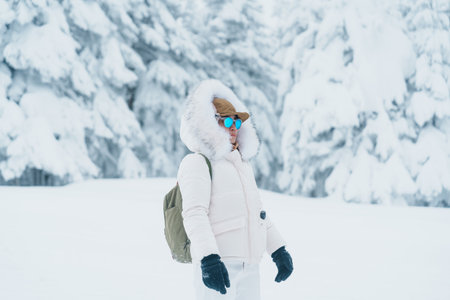Woman tourist sightseeing Snow monster in Winter day at Mount Zao, Yamagata prefecture, Japan. Happy...