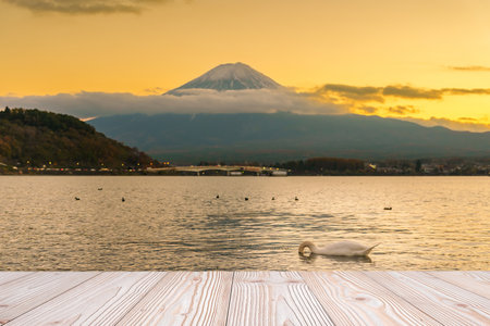 Empty wood table mockup with Mount Fuji view at Kawaguchiko lake background and copy space for text, Mock up for your product display and montage. Japan travel and vacation conceptの写真素材