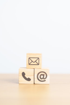Contact Us concepts. Wood block of Email, call Phone and Website Address sign. For Customer support hotline, business Marketing, Corporate, communication and Advertisingの写真素材