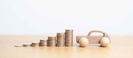 Money Saving, Car Insurance, Financial, vehicle Repair and Maintenance concepts. coins stack and piggy bank with Auto model, Money stack Counting arrangement for deposit and Automobile Taxの写真素材