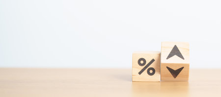 wood block of percentage change to UP and Down arrow. Interest rate, GDP, stocks market, financial, deflation and Inflation, ranking, mortgage, debt, Loan and Economic Recession conceptの写真素材