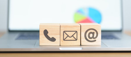 Contact Us concepts. Wood block of Email, call Phone and Website Address sign. For Customer support...