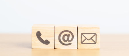 Contact Us concepts. Wood block of Email, call Phone and Website Address sign. For Customer support hotline, business Marketing, Corporate, communication and Advertisingの写真素材