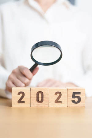 Happy New Year 2025 with magnifying glass and people. hiring, employee, recruitment, job, SEO and jobless conceptの写真素材