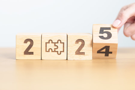 2024 year change to 2025 year block with jigsaw puzzle icon. Business Process, Team, teamwork, Goal,...