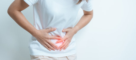 Woman having Stomach pain. Ovarian and Cervical cancer, Cervix disorder, Endometriosis, Hysterectomy, Uterine fibroids, Reproductive system, menstruation, diarrhea and Pregnancy conceptの写真素材