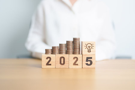 Happy New Year 2025 with Coins stack and lightbulb icon. Business Idea, Creative, Thinking,...