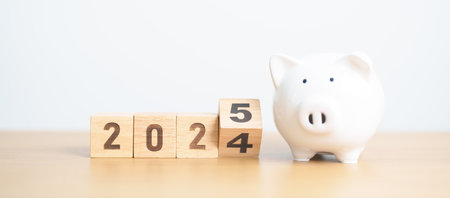 2024 end year to Happy New Year 2025 with piggy bank. Resolution, Goals, Plan, Action, Money Saving, Retirement fund, Pension, Investment and Financial conceptの写真素材