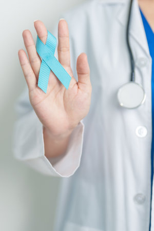 Blue November Prostate Cancer Awareness month, Doctor with Blue Ribbon in hospital for support people life and illness. Healthcare, International men, Father, Diabetes and World cancer dayの写真素材
