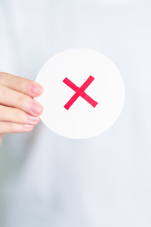 Woman show Wrong symbol paper. True and false, accept and rejected, evaluation, Vote, Poll, Yes or...
