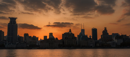 Cityscape view of Shanghai city at sunset. Skyscraper of the Bund, view from Lujiazui in Pudong of...