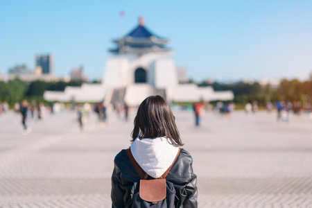 woman traveler visiting in Taiwan, female Tourist sightseeing at National Chiang Kai shek Memorial or Hall Freedom Square, Taipei City. Popular landmark and attractions. Asia Travel conceptの写真素材