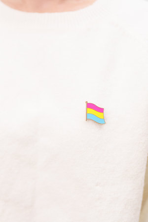 Pansexual Visibility Day and Panromantic May Awareness Day and LGBT pride month concept. hand holding pink, yellow and blue heart shape for Lesbian, Gay, Bisexual, Transgender and Marriage Equalityの写真素材