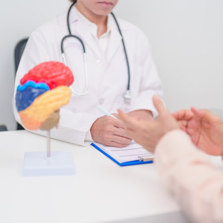 Elderly Patient consulting Doctor to Brain disease, Senior Health Medical Diagnosis. Anatomy Brain model for Explanation, Brain Tumor, neurological disorders, Dementia, alzheimer, parkinson and Mentalの写真素材