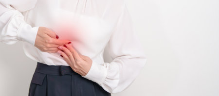 Business Woman having Liver pain for Liver disease, cancer and Tumor, Jaundice, Viral Hepatitis A, B, C, D, E, Cirrhosis, Failure, Enlarged, Hepatic Encephalopathy, Ascites Fluid in Belly and healthの写真素材