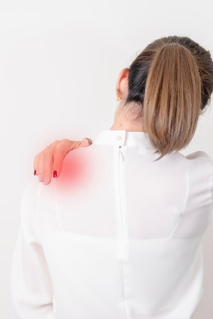 Business Woman having Shoulder Pain for Muscle Inflammation and Sprain, Myofascial ache syndrome and Fibromyalgia, Shoulder Myalgia, Scapular Tightness, Cervical Spine, Rheumatism and Office Syndromeの写真素材