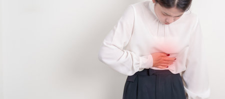 Business woman having abdomen aches for Stomach pain, digestion with constipation or Diarrhea from food poisoning, female problem and Endometriosis, Hysterectomy, Stomachache and Menstrual conceptの写真素材