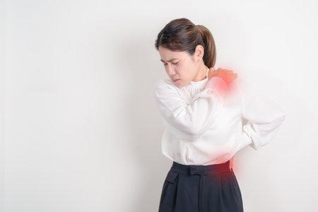 Business woman having back body ache for concepts of Back Muscle Strain, Piriformis Syndrome, Low Back Pain, Lumbar Disc Degeneration, Herniated, Osteoporosis, Spinal Compression and Office syndromeの写真素材