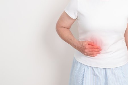 Elderly Woman having Pancreatitis for Pancreas pain and disease, Gallbladder, Bile Duct, Duodenum, Small intestine. Pancreatic cancer, Acute and Chronic pancreatitis, Digestive system and Healthの写真素材