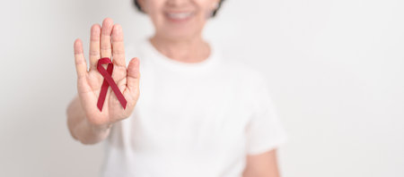 Elderly with Burgundy Ribbon for March Multiple Myeloma Cancer Awareness month, September Sickle...