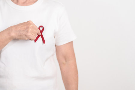 Elderly with Burgundy Ribbon for March Multiple Myeloma Cancer Awareness month, September Sickle...