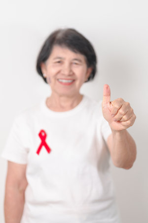 Elderly with Red Ribbon for December World Aids Day, MADD, October Red ribbon week, February Heart...