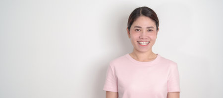 Adult woman with pink Shirt for Pink October Breast Cancer Awareness month, May Women Health, women rights, Empowerment, March International Women day, February Valentine, May International Motherの写真素材