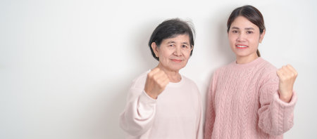 Couple woman with pink Shirt for Pink October Breast Cancer Awareness month, women rights,...