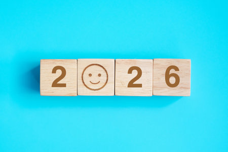 Smile face block with 2026 text on blue background. Satisfaction, feedback, Review and New Year...