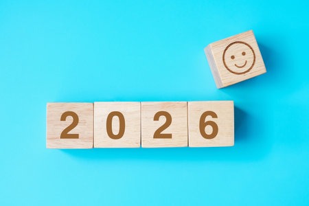 Smile face block with 2026 text on blue background. Satisfaction, feedback, Review and New Year...