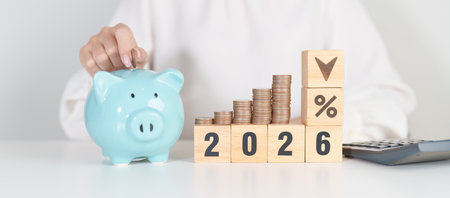 2026 New year with percentage change to UP and Down arrow with coin stack. Interest rate, GDP,...