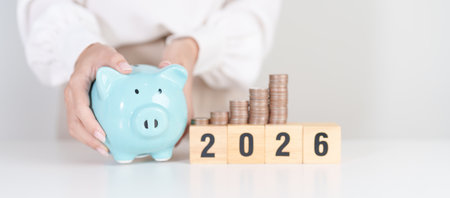 Happy New Year 2026 with piggy bank. Resolution, Goals, Plan, Action, Money Saving, Retirement fund,...