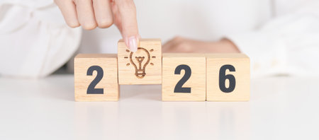 2026 year block with lightbulb. Business Idea, Creative, Thinking, brainstorm, Goal, Resolution, strategy, plan, Action, change and New Year start conceptsの写真素材
