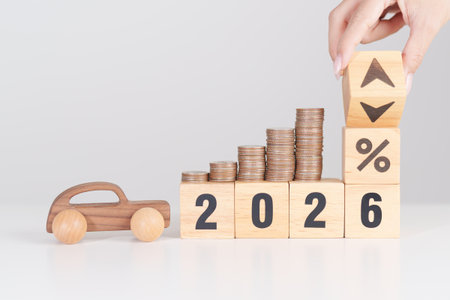 2026 New Year with percentage change to UP and Down arrow, car model and coin stack. Car loan,...