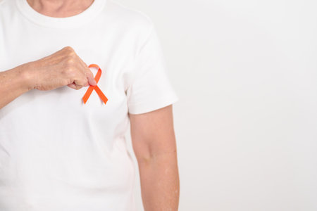 Elderly with Orange Ribbon for September Leukemia, March Kidney cancer day, Multiple Sclerosis,...