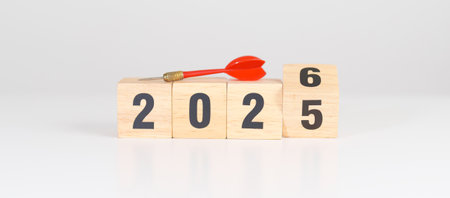 red dart with 2025 year blocks. Goal, plan, action, target, strategy, leadership, New Year and...