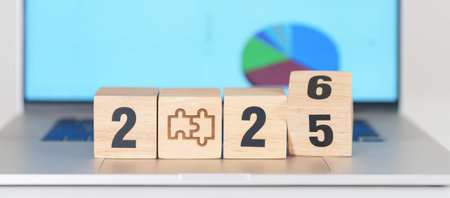 2025 end year to Happy New Year 2026 block with jigsaw puzzle icon against laptop computer. Business...