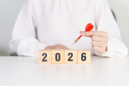 red dart with  chess people and 2026 year blocks.. Goal, plan, action, target, strategy, leadership,...