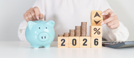 2026 New year with percentage change to UP and Down arrow with coin stack. Interest rate, GDP,...