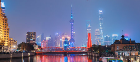 Cityscape view of Shanghai city at night. Skyscraper of Lujiazui in Pudong, view from The Bund of...