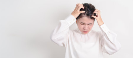 Business woman having itchy Scalp and Head hair, Dandruff, Dry Scalp, Skin Allergy Seborrheic...