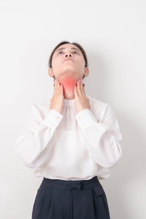 business Woman checking Thyroid gland disease. Hand holding Neck pain and Sore Throat....