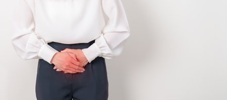 Business woman having Bladder pain for concepts of Bladder disease, Cancer Awareness Month May,...