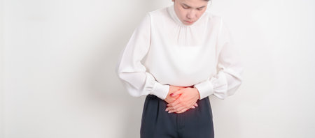 Woman having Colon pain for Colonic disease, Inflammatory Bowel, IBD, Colorectal cancer, Ulcerative...
