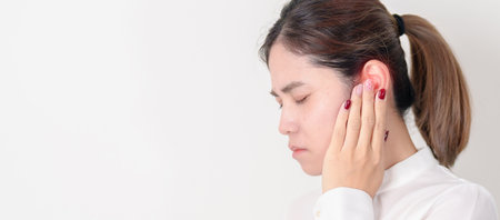 Business Woman having Ear pain for concept of Ear disease, Atresia, Otitis Media, Infection,...