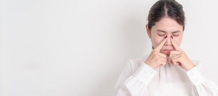 Business Woman having Nose pain for concepts of Nose disease, Common Cold, Influenza, Flu, Covid 19,...