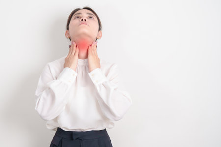 business Woman checking Thyroid gland disease. Hand holding Neck pain and Sore Throat....