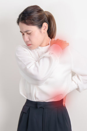 Business woman having back body ache for concepts of Back Muscle Strain, Piriformis Syndrome, Low...
