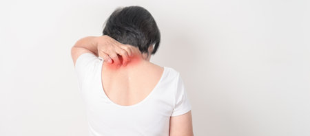 Elderly woman itching Neck and body scratching for Skin Allergy from insect bite and food...